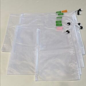7 various sized netted bags for fruit, but new and can use for anything.